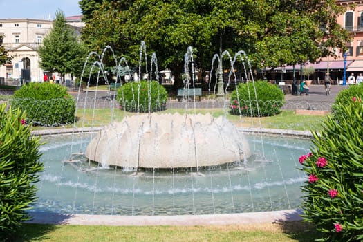 Verona, Italy - June 2022: the Fountain of Alps, located in Piazza Bra garden