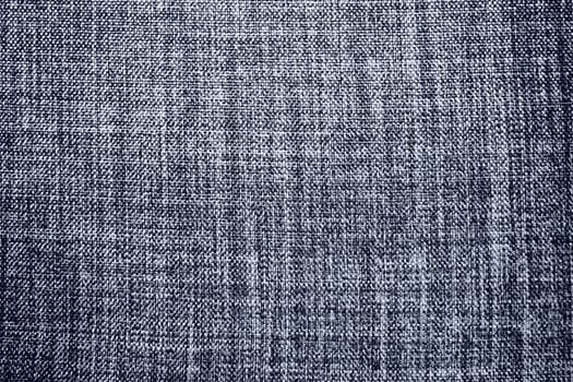 gray background fabric texture. A piece of woolen cloth is neatly laid out on the surface. Weave and textile texture. Dress fabric or for kitchen needs, tablecloth or curtains, close-up. Dash.