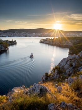 Town of Sibenik in Croatia with canal Sveti ante at sunrise