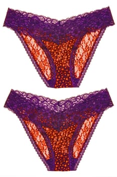 Underwear woman isolated. Set of luxurious elegant pink lacy thongs panties with colorful orange stars pattern isolated. Clipping path. Macro. Underwear fashion.Two views.