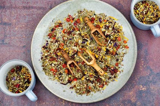 Herbal tea with healthy herbs in scoop. Natural herbal medicine. Flat lay