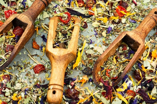 Herbal tea with healthy herbs in scoop. Natural herbal medicine. Flat lay
