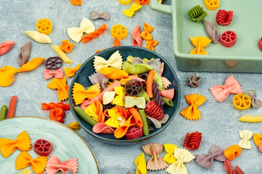 Colorful Italian pasta. Various colors of pasta. Texture background