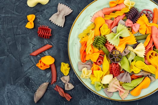 Colorful Italian pasta. Various colors of pasta. Texture background