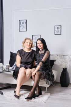 Mother and her daughter together. Family relations concept.