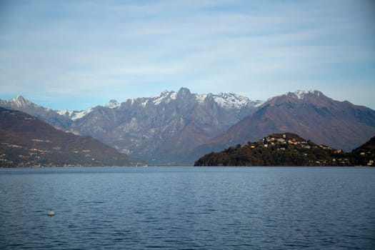 Lake landscape with mountains on the background, horizontal view