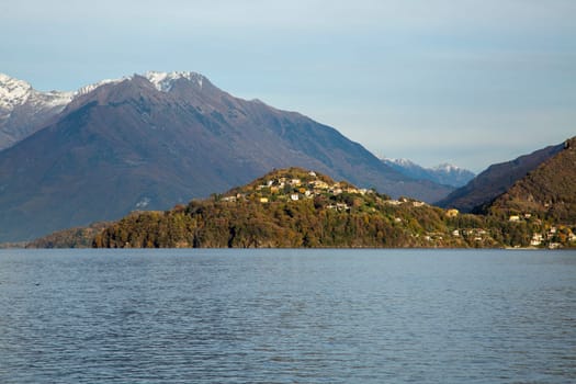 Lake and mountains under sunset light, landscape view