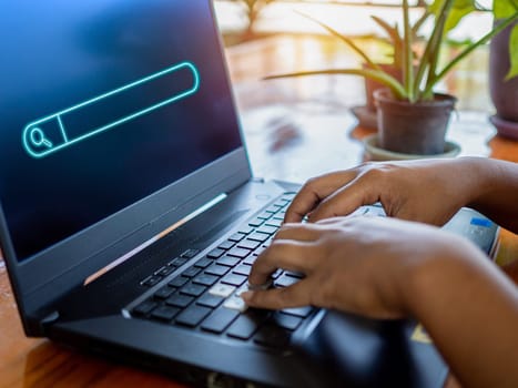 Human hand working on computer and protection icon. Represents the code protection. Security concept and communication technology