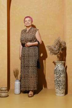 Old woman posing under harsh sunlight