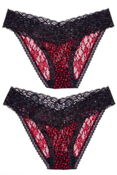 Underwear woman isolated. Set of luxurious elegant black lacy thongs panties with colorful red stars pattern isolated. Clipping path. Macro. Underwear fashion.Two views.