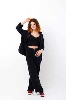 Lovely teenager girl in casual black clothes