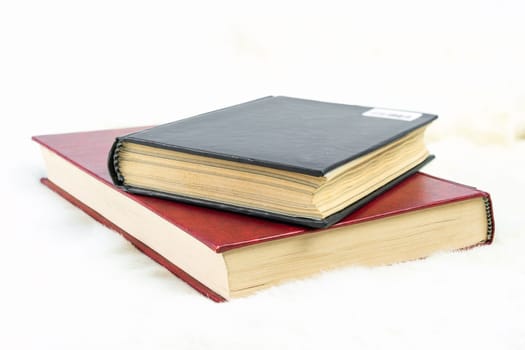 Close up book stacked on table