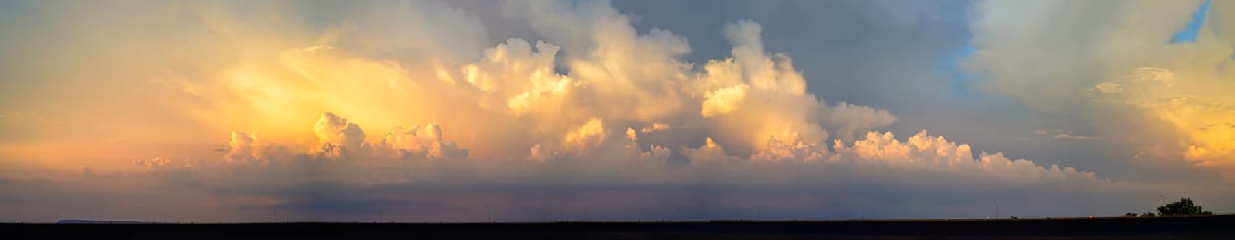 Panorama of Dramatic vibrant color with beautiful cloud of sunrise. Panoramic image