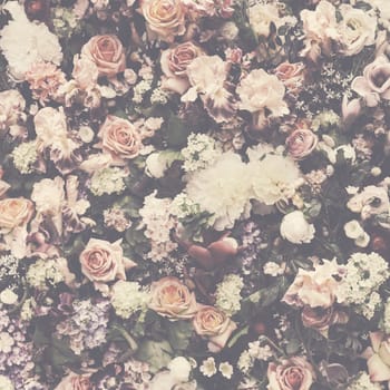 Fresh flower pattern background for vintage wedding decoration and invitation design layout. Floral bouquet wall arrangement in retro style pastel colors.