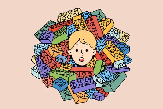 Cute boy child head in pile of Lego constructor. Stunned small kid playing with construction set. Children hobby concept. Vector illustration.