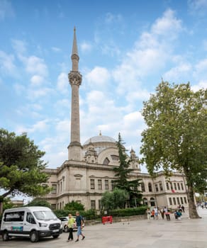 Istanbul, Turkey - August 31 2022: View from Meclis-i Mebusan Street overlooking Baroque style Dolmabahce Mosque, suited at the waterside of Kabatas, in Beyoglu district