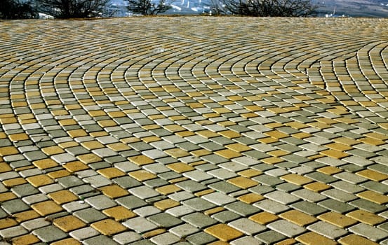Paving stones in the street.