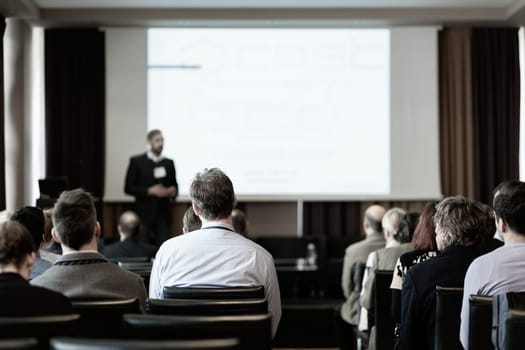 Speaker at Business Conference and Presentation. Audience in the conference hall. Business and Entrepreneurship.