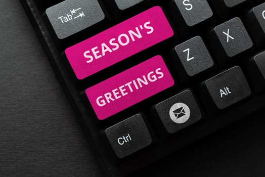 Sign displaying Season's Greetings, Word for Used as an expression of goodwill during festivities