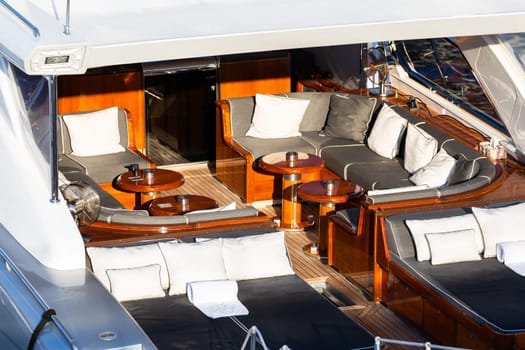 Luxury yacht. Comfortable expensive wooden design and furniture for holiday recreation tourism or travel and wealth concept