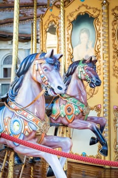 Florence, Italy - Circa March 2022: vintage carousel horse - antique attraction
