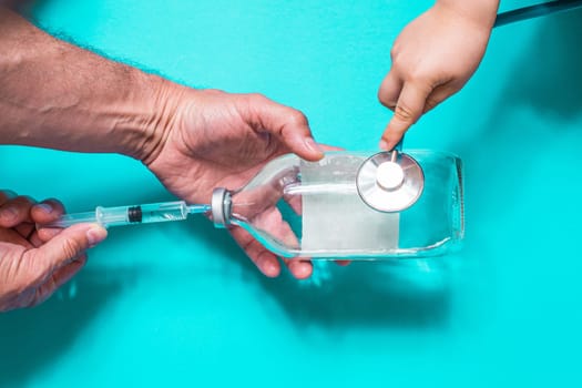 Vaccination debate concept. Biotechnology banner with medical syringe stethoscope and money. Copyspace for text. flatlay.