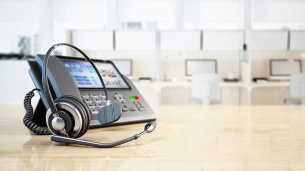 Modern VoIP phone and headset standing on wooden office table. Call center, marketing and technical support concept. 3D illustration.