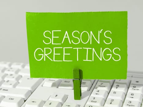 Conceptual caption Season's Greetings, Word for Used as an expression of goodwill during festivities