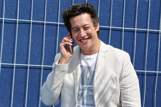 Bjoern Bussler on the phone - ARD-TV-broadcast "Always again on Sundays"". The entertainment show on Sunday morning at Europapark Rust with Stefan MROSS from 14.06.2015"