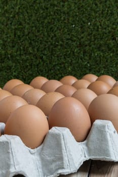 Perspective view of a big group of chicken eggs.