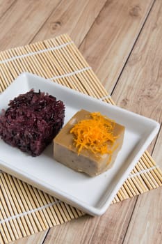 Sweet Thai recipe made with black rice, sugar, and egg.