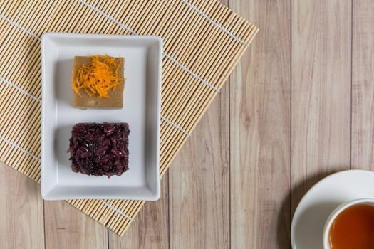 Sweet Thai recipe made with black rice, sugar, and egg.