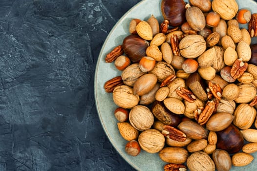 Walnut, chestnut, almond, hazelnut on the table.Healthy snacks Vegan food