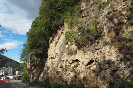 Mountain range in Mali Zvornik, Serbia, September 29, 2022 Brasina antimony deposit, Guchevo. Rocks overhanging the road.