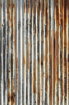 Artistic of old and rusty zinc sheet wall. Vintage style metal sheet texture.