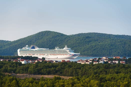 cruise ship anchored on a small canal at sibenik