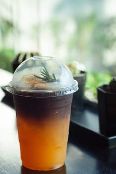 Glass of americano mixed with orange juice, stock photo
