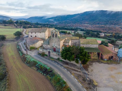 Santa Fe de Valldeperes Romanesque church from the 12th century linked to Castelladral, with a single nave and apse. With two side chapels as a transept to place altarpieces. It is worth noting the belfry. Catalonia Spain