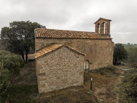 Romanesque church of Sant Cugat de Salou or Raco in Navas (Bages) Catalonia. Spain. Greek cross plan and Lombard decoration, 10th century, Aerial plan view. entrance detail view