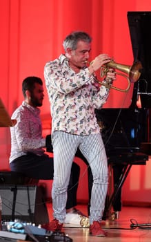 Cracow, Poland - July 4, 2022: Adam Baldych Quartet and Paolo Fresu live on stage of  Krakow Philharmonic at Summer Jazz Festival in Cracow, Poland