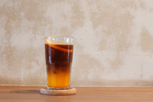 Glass of americano mixed with orange juice, stock photo