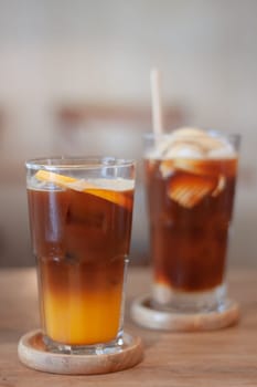 Glass of americano mixed with orange juice, stock photo