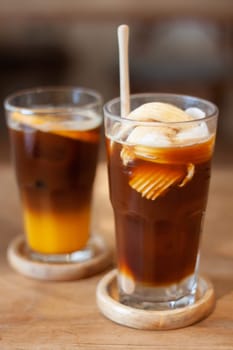 Glass of americano mixed with coconut, stock photo