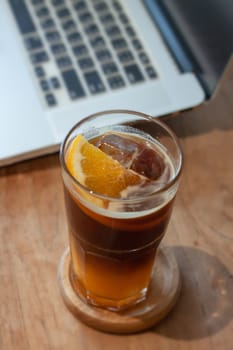 Glass of americano mixed with orange juice, stock photo