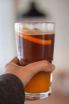 Glass of americano mixed with orange juice, stock photo