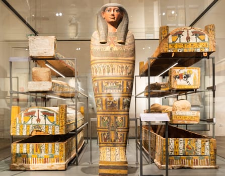 Turin, Italy - June 2022: Egyptian Museum, the Three Systers mummies room, 772 - 664 BC. Egyptian archaeology, sarchophagus.