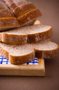 A loaf of sliced whole wheat bread