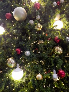 Christmas tree with light bulbs background, stock photo