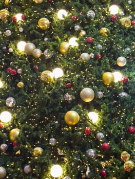 Christmas tree with light bulbs background, stock photo