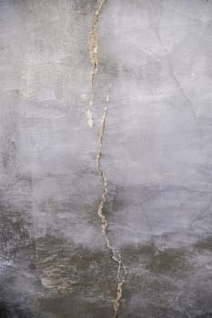 Detail of old ruined cement wall